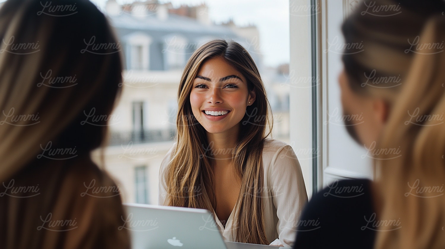 Young Woman at Table with Laptop