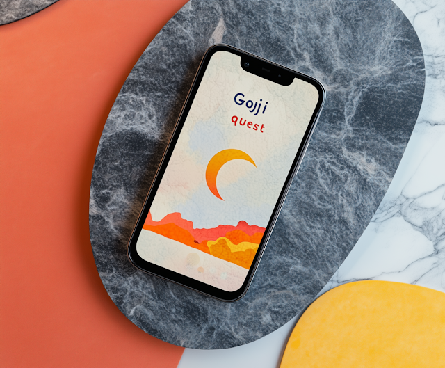 Smartphone on Marble with Goji Quest Graphic